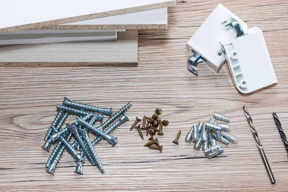 Installation Of Chipboard Furniture In A Carpentry Workshop. Accessories And Tools For Carpenters